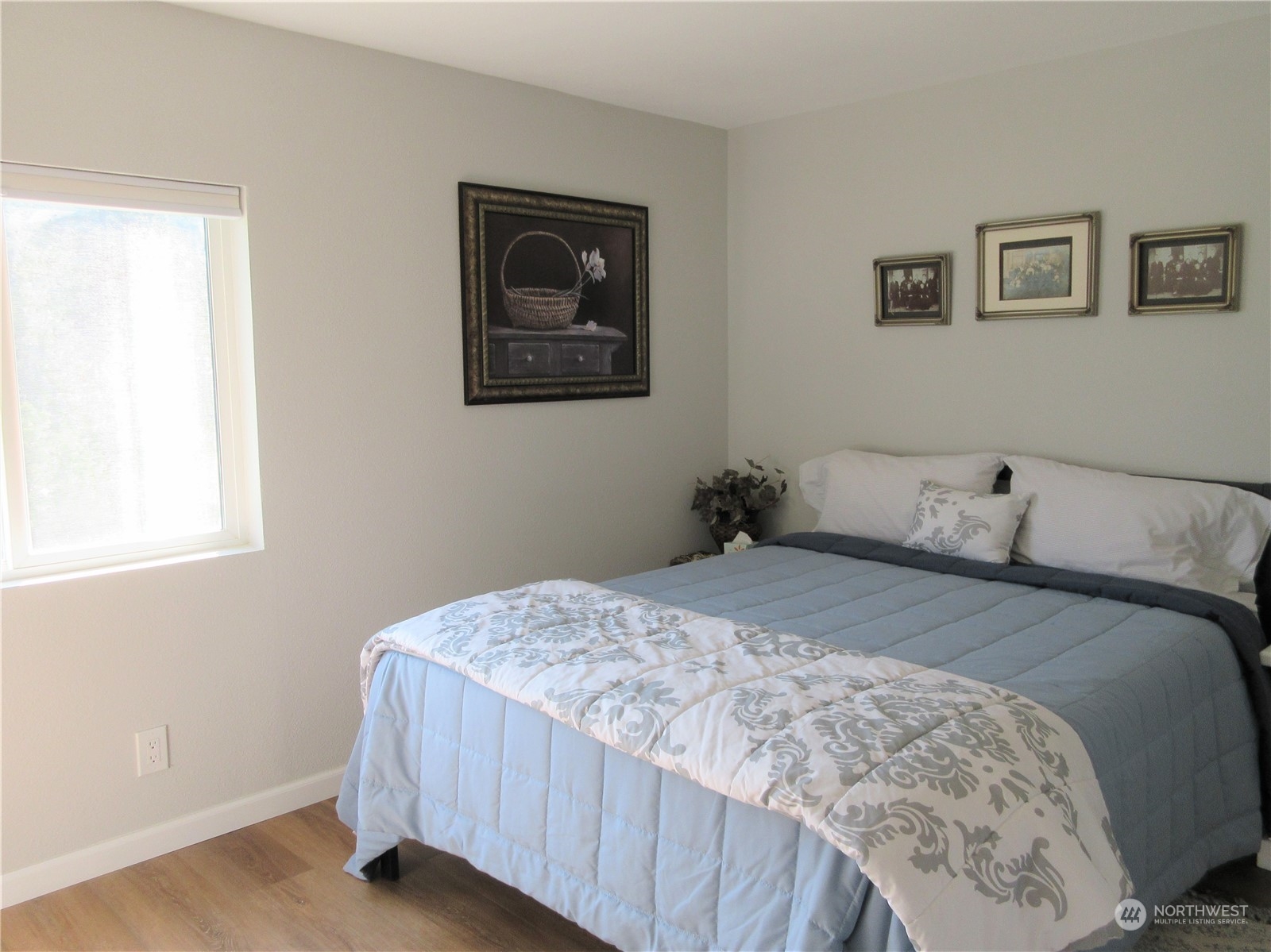 156 West Curlew Lake Road Republic, WA 99166 - Photo 19 of 36 a bedroom with a bed and a window
