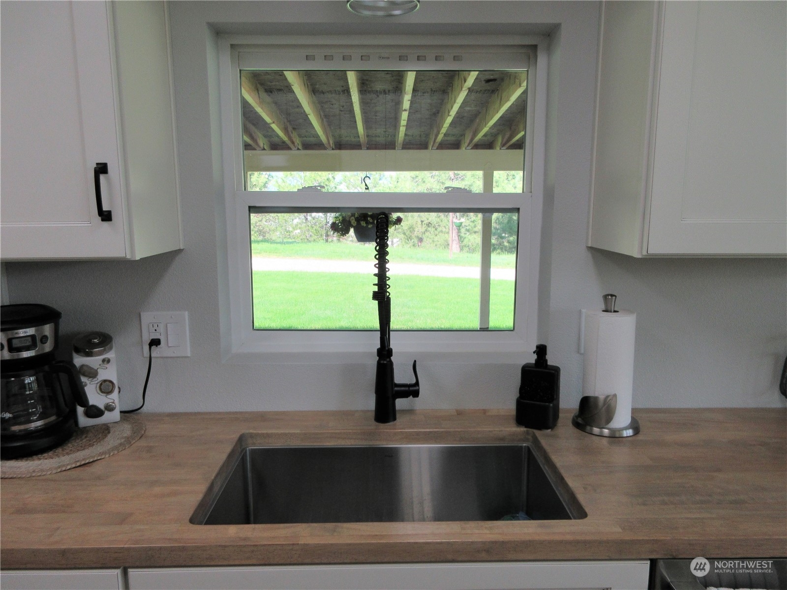 156 West Curlew Lake Road Republic, WA 99166 - Photo 3 of 36 a kitchen with a sink and a window
