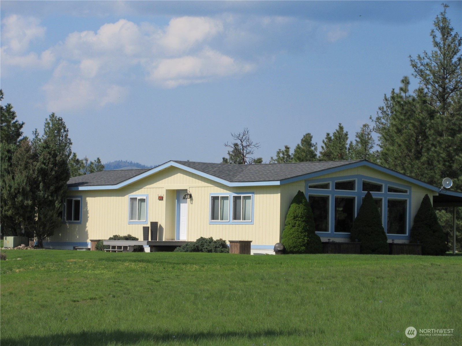 156 West Curlew Lake Road Republic, WA 99166 - Photo 31 of 36 a view of a house with a backyard