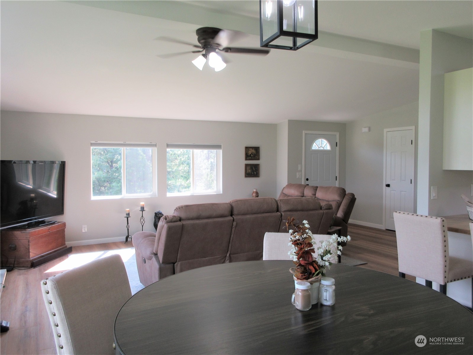 156 West Curlew Lake Road Republic, WA 99166 - Photo 7 of 36 a living room with furniture or chandelier and a flat screen tv