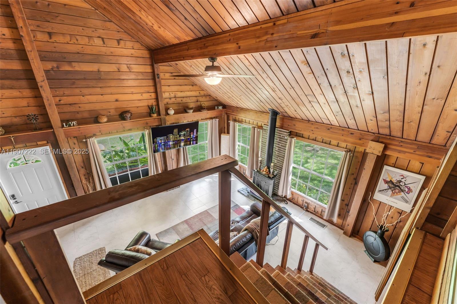 18895 Southwest 212th Street Miami, FL 33187 - Photo 12 of 36 a view of an chairs in the balcony