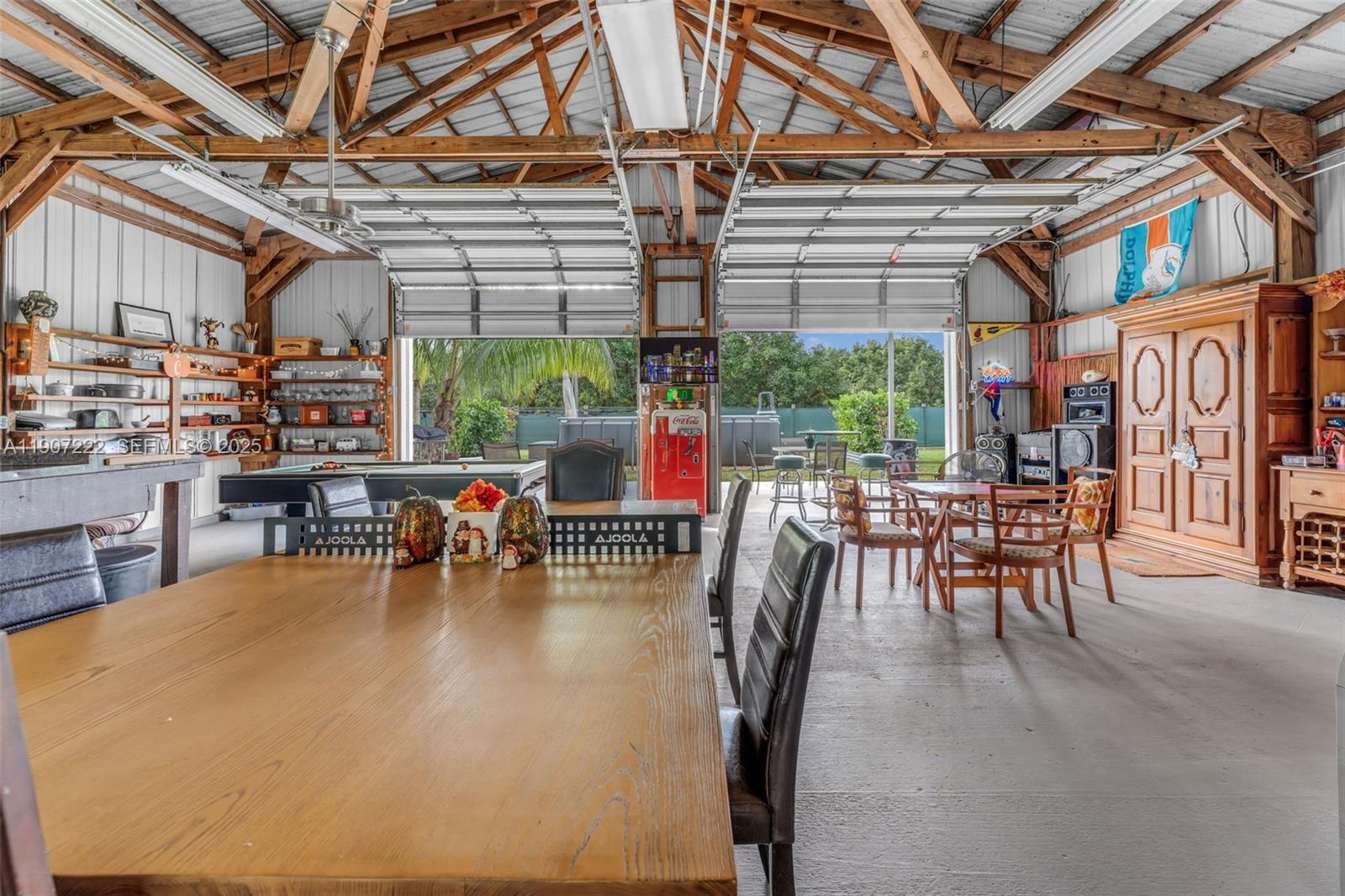18895 Southwest 212th Street Miami, FL 33187 - Photo 29 of 36 a dining hall with lots of tables and chairs