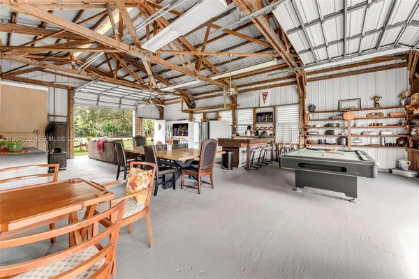 a outdoor space with lots of tables and chairs