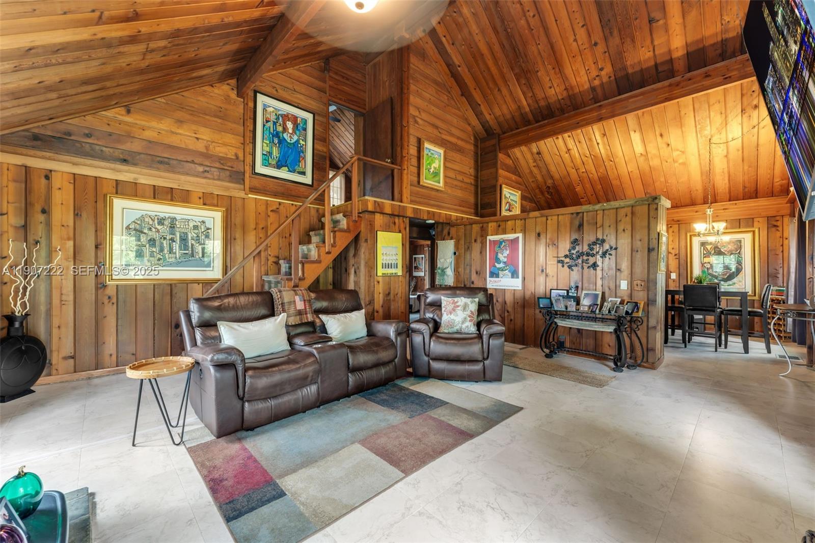 18895 Southwest 212th Street Miami, FL 33187 - Photo 10 of 36 a building outdoor space with patio furniture and potted plants