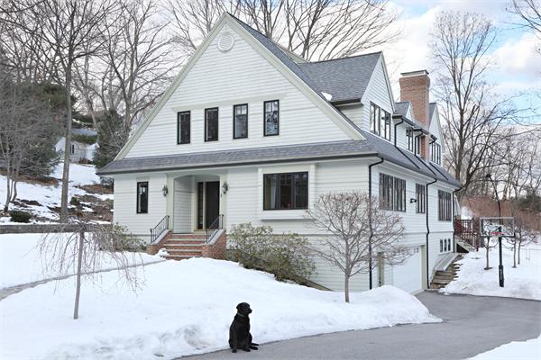 1 Valley Spring Road Newton, MA 02458 - Photo 1 of 10 a view of a white house with a yard
