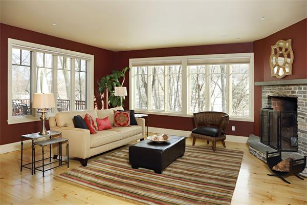 1 Valley Spring Road Newton, MA 02458 - Photo 4 of 10 a living room with furniture a fireplace and large windows