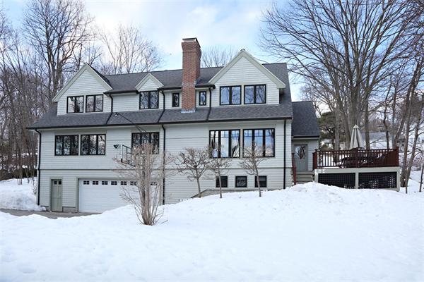 1 Valley Spring Road Newton, MA 02458 - Photo 10 of 10 a view of a house with a yard and roof deck