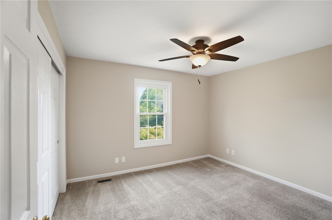 10 Chase Court Springboro, OH 45066 - Photo 42 of 75 This serene bedroom offers a peaceful retreat with ample natural light.
