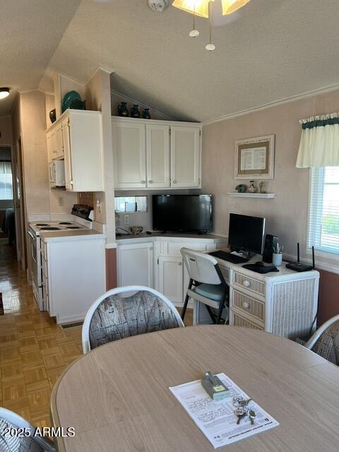 434 South Ironstone Drive, Unit 434 Apache Junction, AZ 85119 - Photo 19 of 19 a bedroom with a bed a couch and dresser