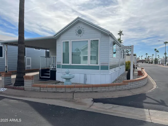 a front view of a house with garage
