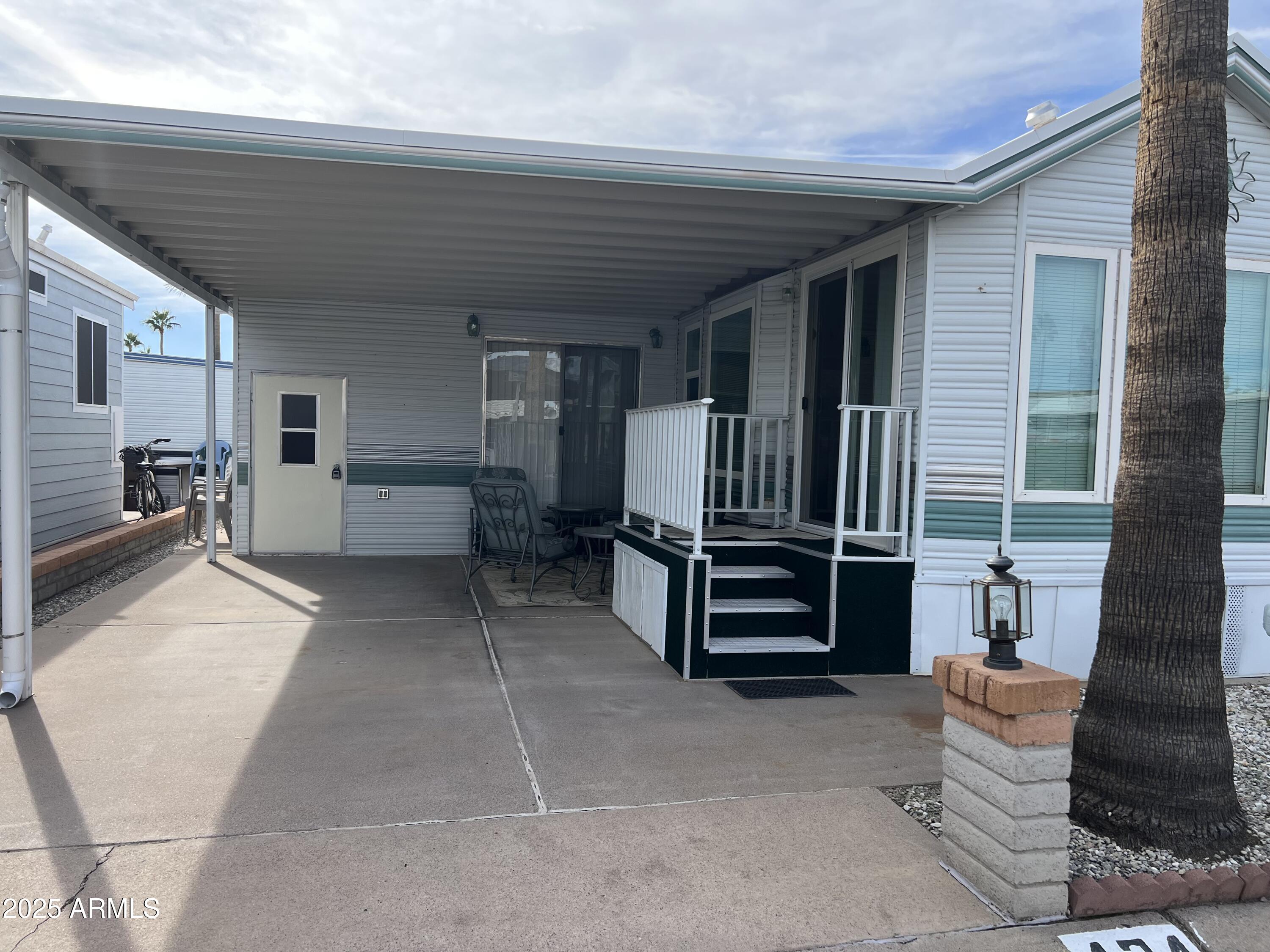 434 South Ironstone Drive, Unit 434 Apache Junction, AZ 85119 - Photo 3 of 19 a view of outdoor seating area