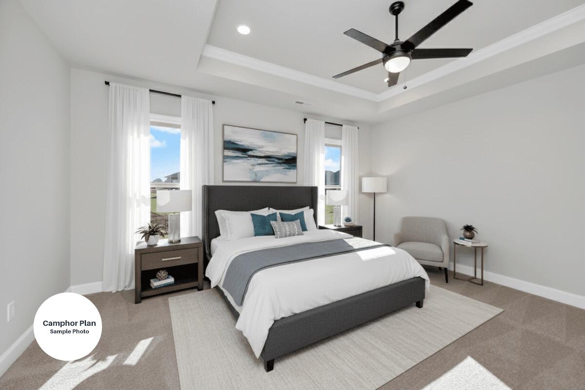 2740 Louis Circle Crestview, FL 32536 - Photo 4 of 8 a bedroom with a bed mirror and a window