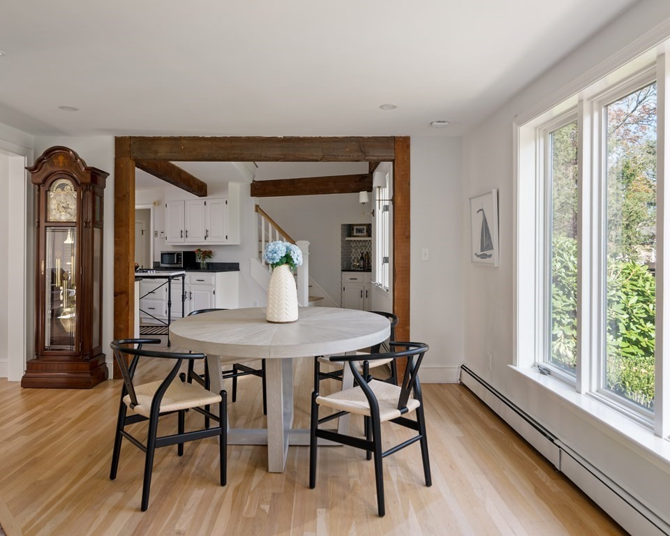 58 Jerusalem Road Cohasset, MA 02025 - Photo 11 of 24 a view of a dining room with furniture window and wooden floor