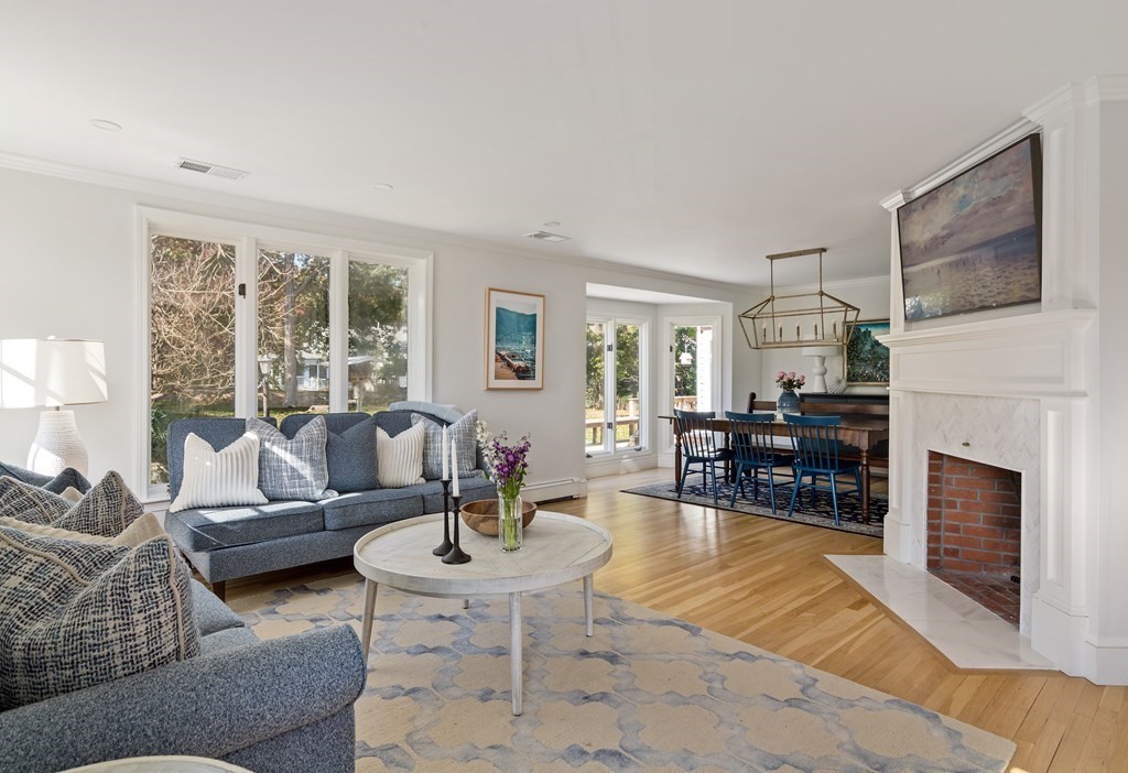 58 Jerusalem Road Cohasset, MA 02025 - Photo 12 of 24 a living room with furniture fireplace and window