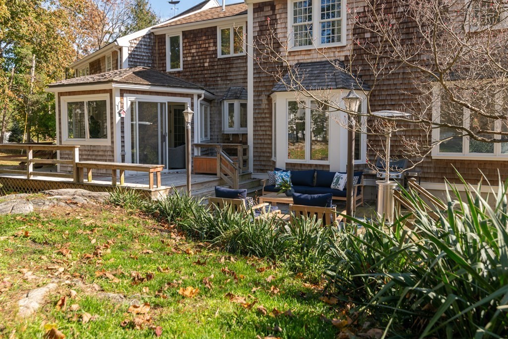 58 Jerusalem Road Cohasset, MA 02025 - Photo 2 of 24 front view of a house with a yard