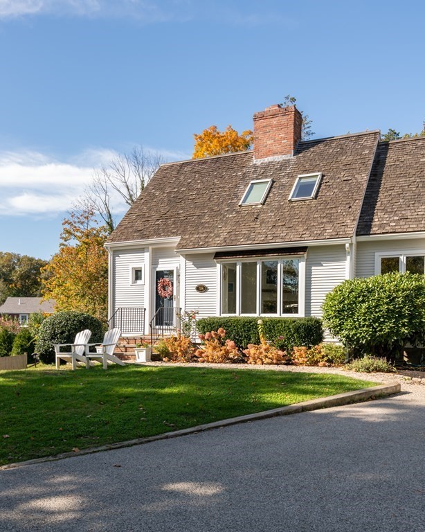 58 Jerusalem Road Cohasset, MA 02025 - Photo 24 of 24 front view of a house with a small yard
