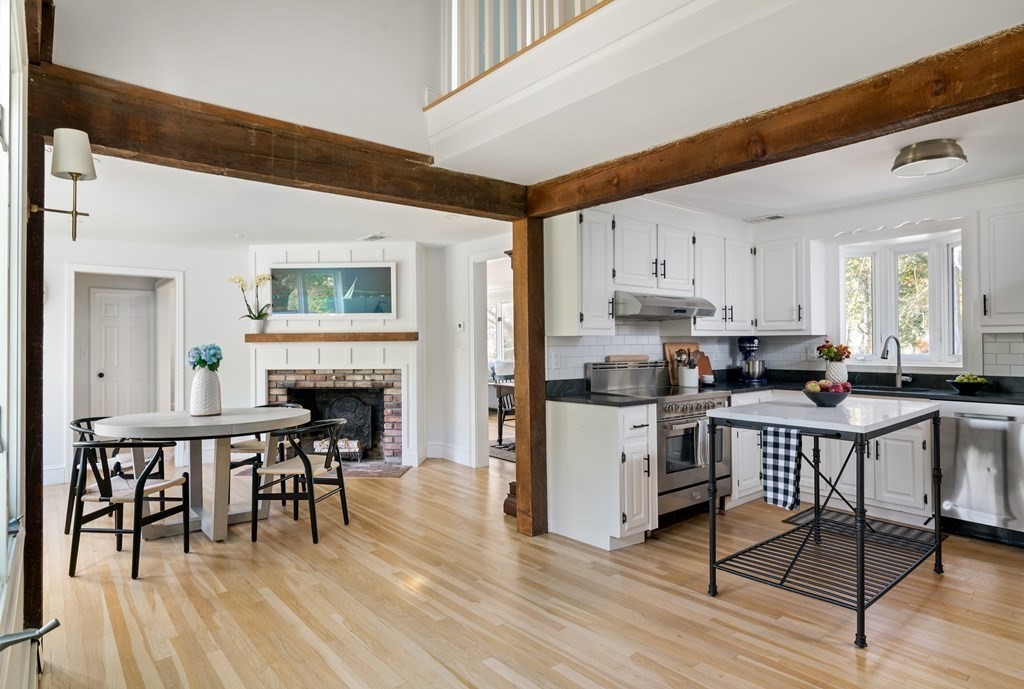58 Jerusalem Road Cohasset, MA 02025 - Photo 3 of 24 a view of a dining room with furniture and wooden floor