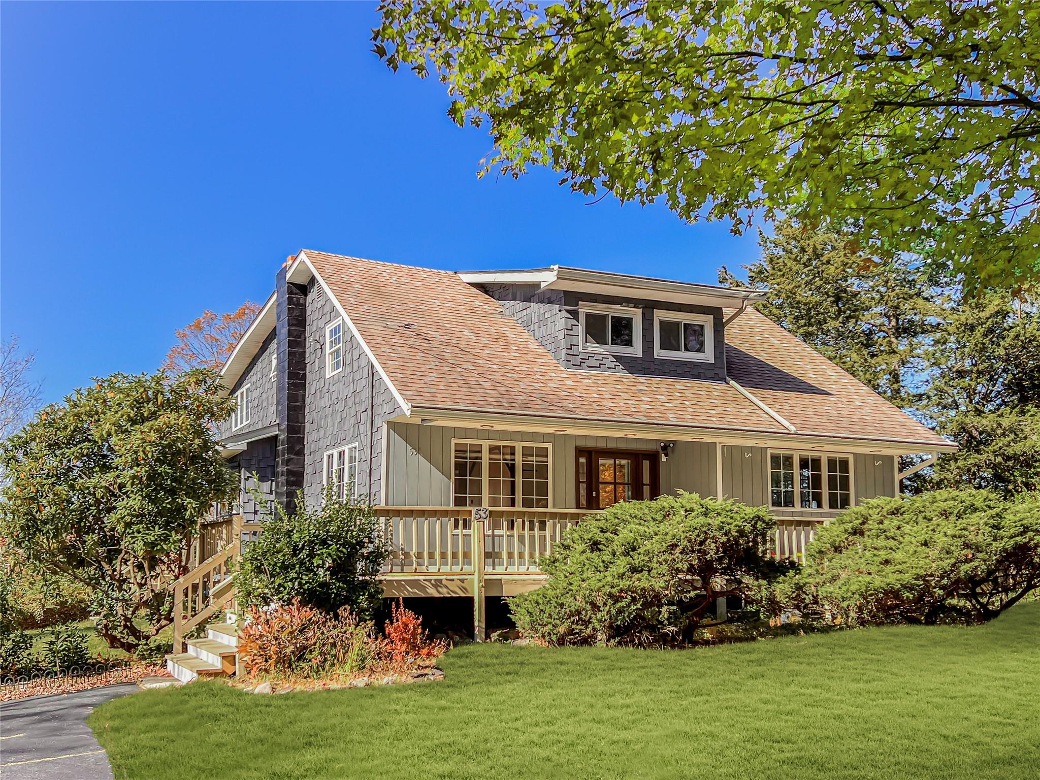 53 Jameson Hill Road Clinton Corners, NY 12514 - Photo 1 of 1 a front view of a house with a garden