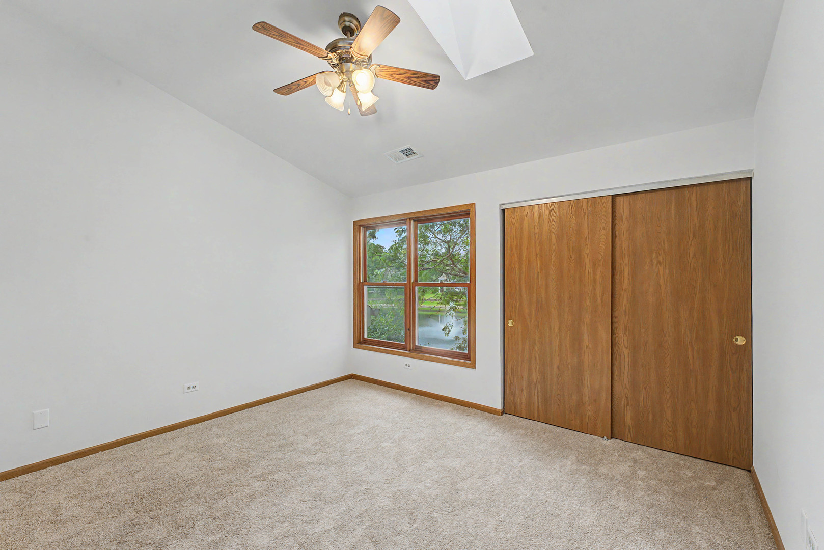 1953 North Coldspring Road Arlington Heights, IL 60004 - Photo 19 of 27 an empty room with windows and fan