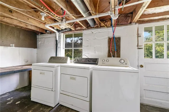 a utility room with dryer and washer