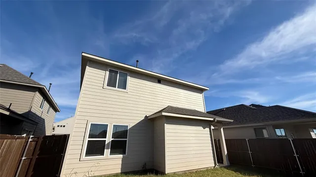 a front view of a house with a garage