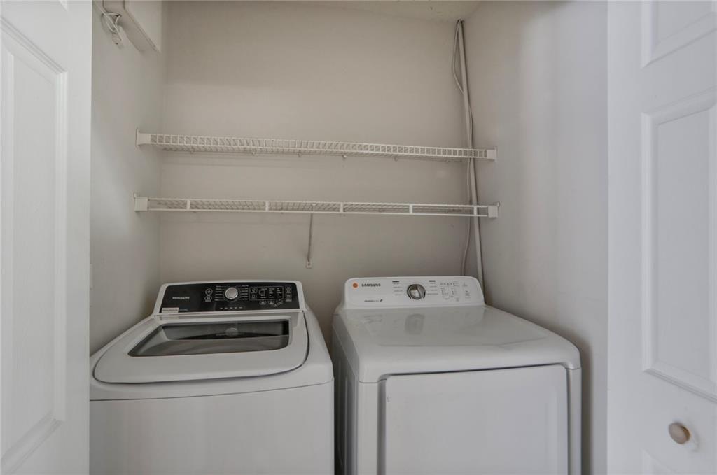 3756 Old Oak Court Powder Springs, GA 30127 - Photo 14 of 14 a utility room with dryer and washer