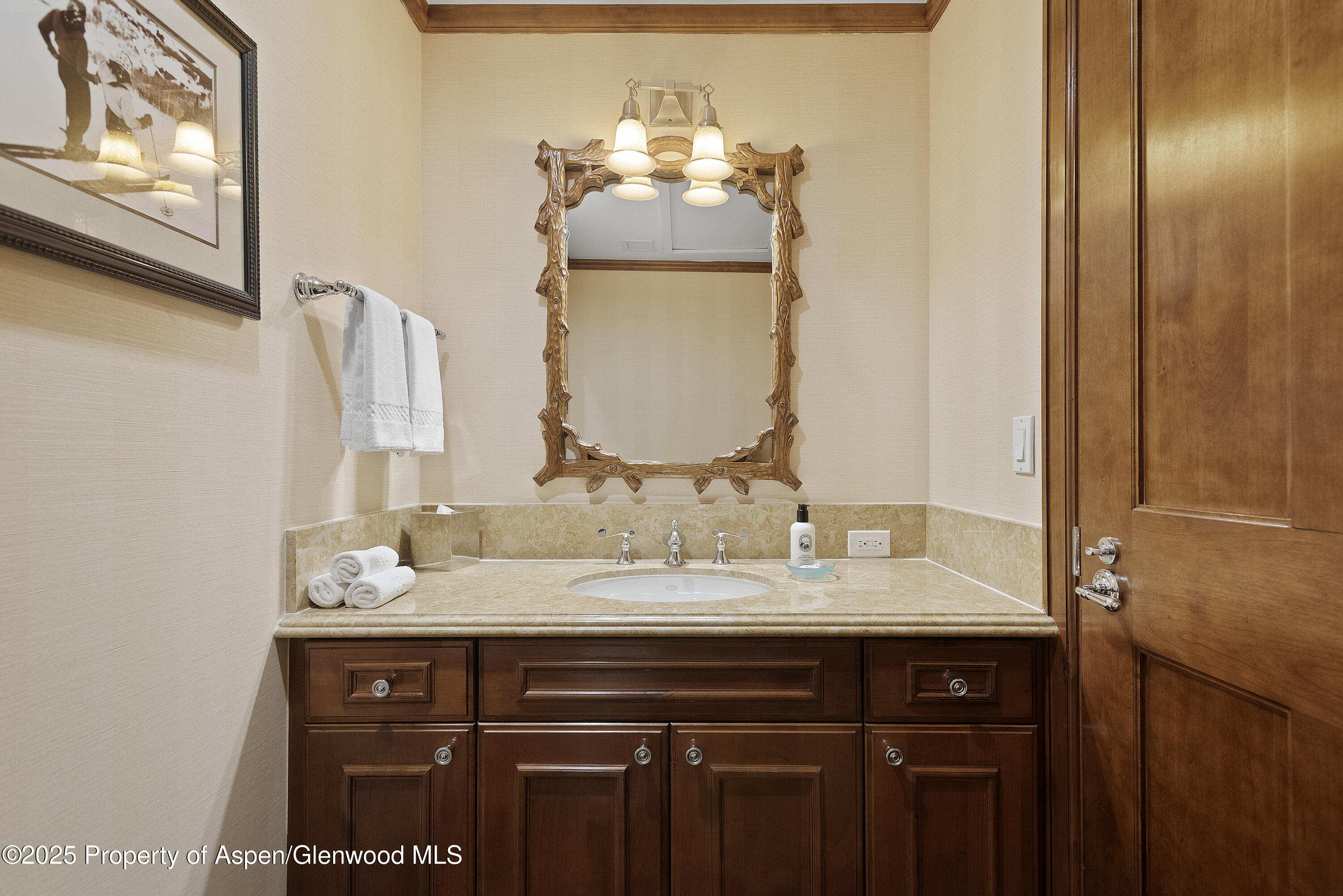 39 Boomerang Road, Unit 8402/WINTER INTEREST 16 Aspen, CO 81611 - Photo 7 of 12 a bathroom with a sink vanity and a mirror