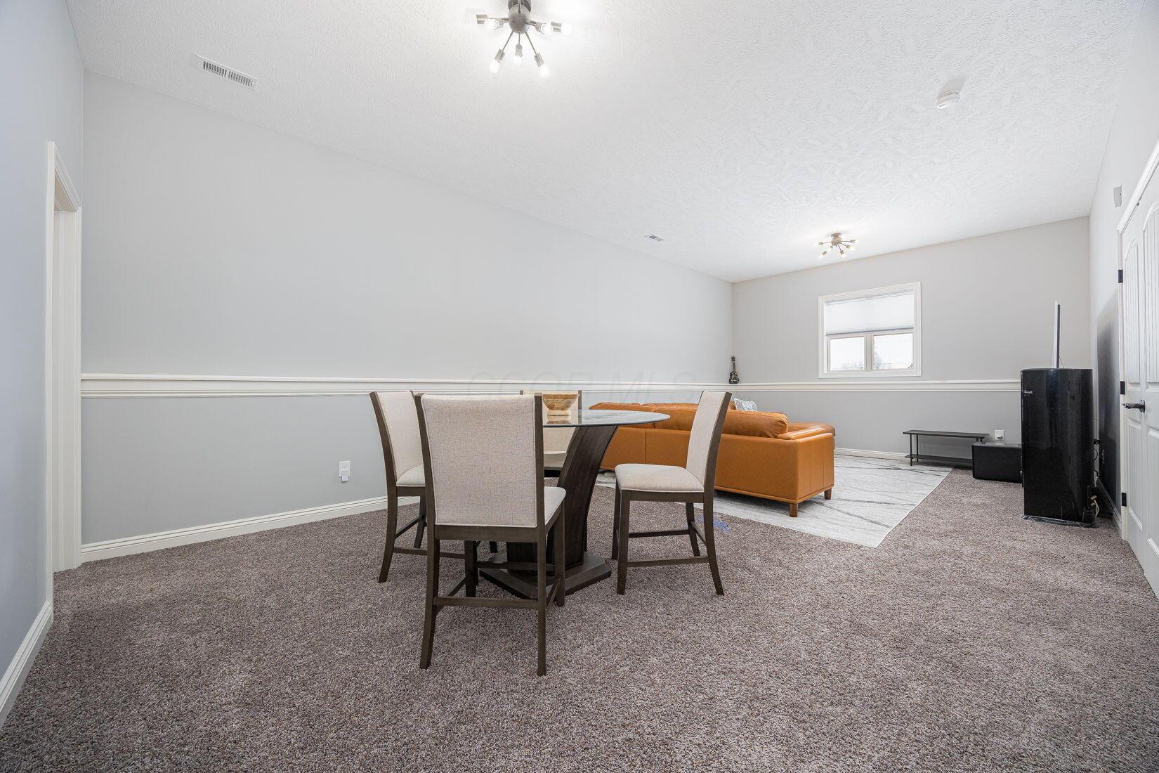 4908 South Section Line Road Delaware, OH 43015 - Photo 29 of 99 Mid level living space with full bath