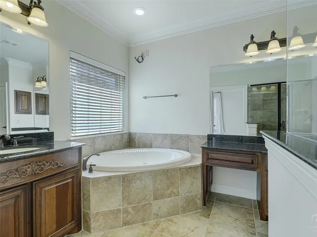 a bathroom with a sink and a bathtub