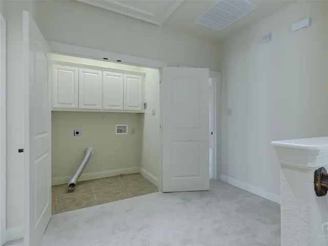a view of storage and utility room with a sink