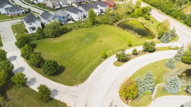 a view of a swimming pool in he middle of the house