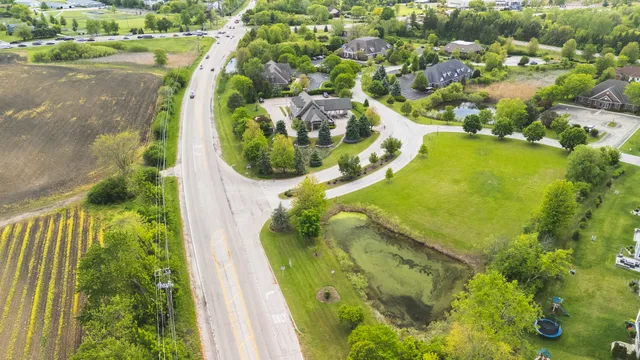 a view of a lake with a yard