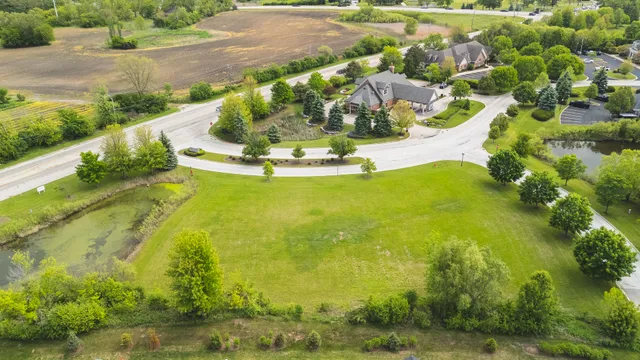a view of a lake with a yard
