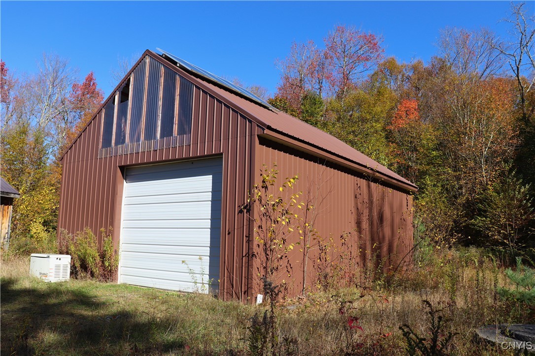158 Fox Brook Road Altmar, NY 13302 - Photo 26 of 36 Large steel sided garage