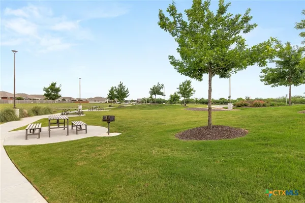 a view of a park with swings