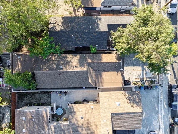 an aerial view of a house with a garden