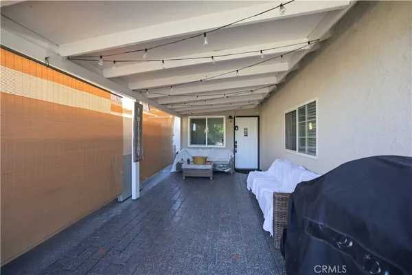 a bedroom with furniture