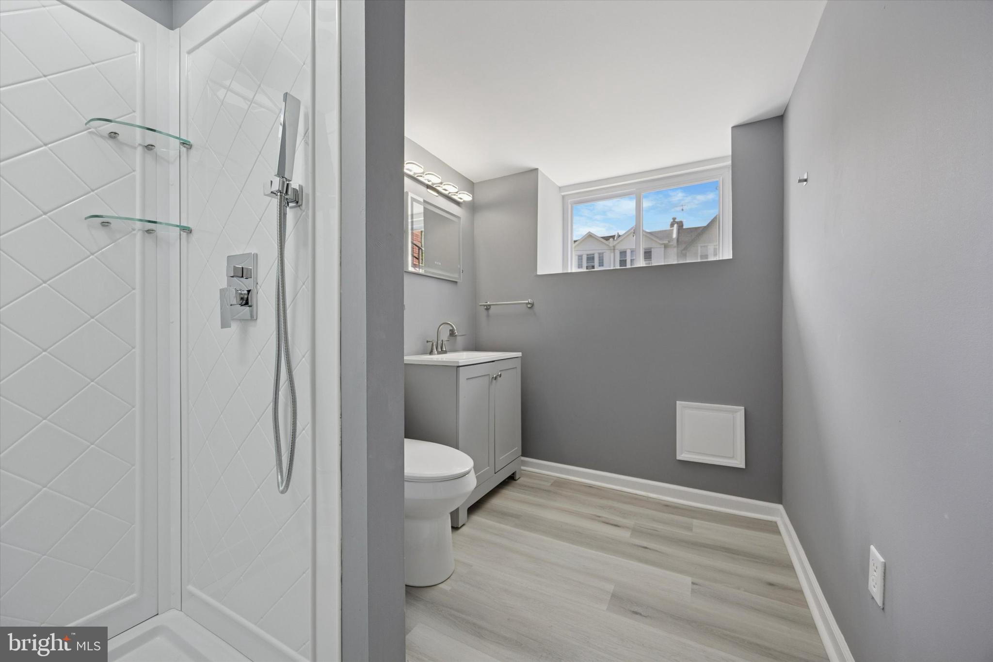 5407 Arlington Street Philadelphia, PA 19131 - Photo 14 of 15 a bathroom with a sink and a toilet