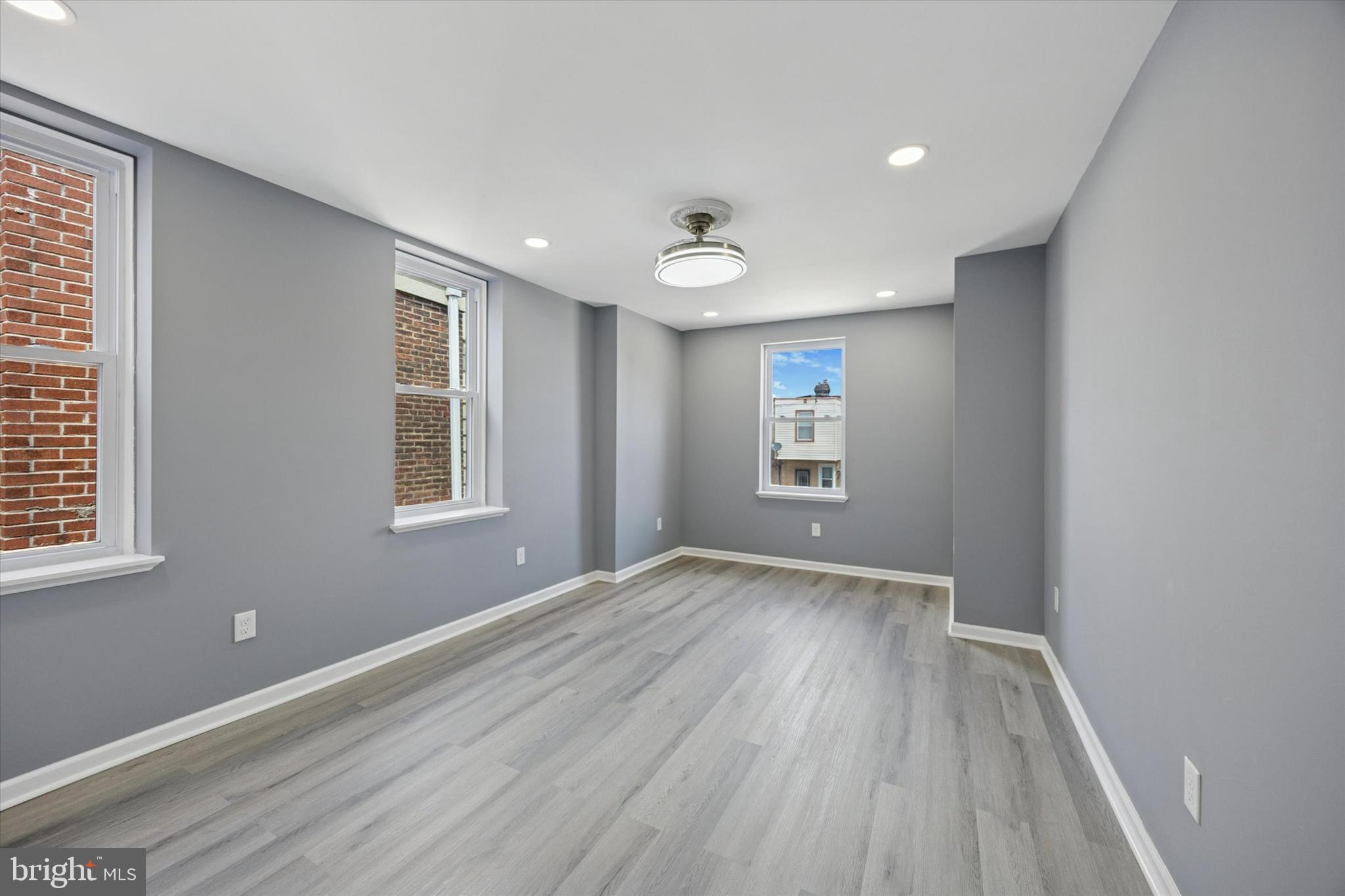 5407 Arlington Street Philadelphia, PA 19131 - Photo 10 of 15 an empty room with windows and closet