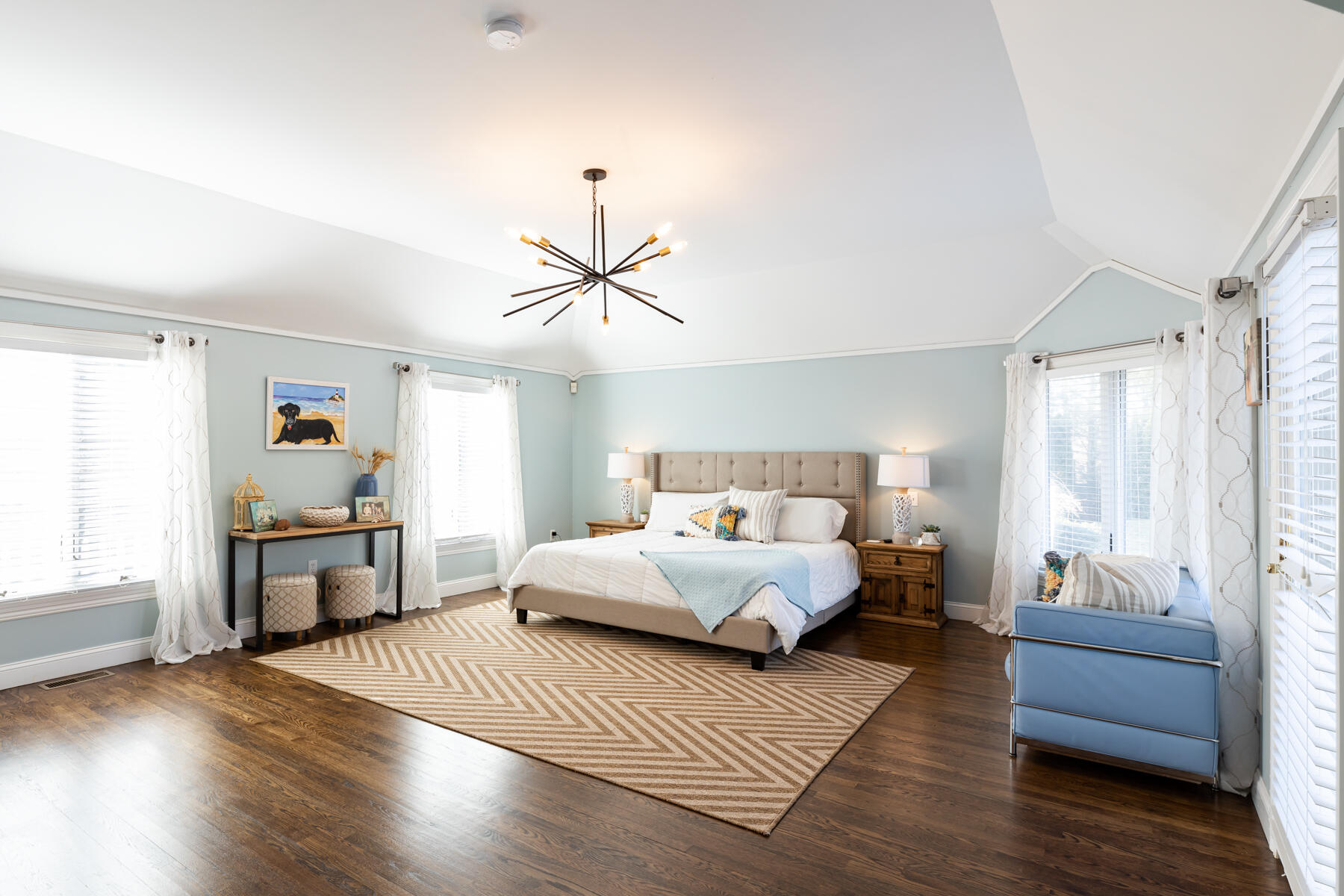 135 Paddock Circle Mashpee, MA 02649 - Photo 29 of 60 a spacious bedroom with a bed and wooden floor