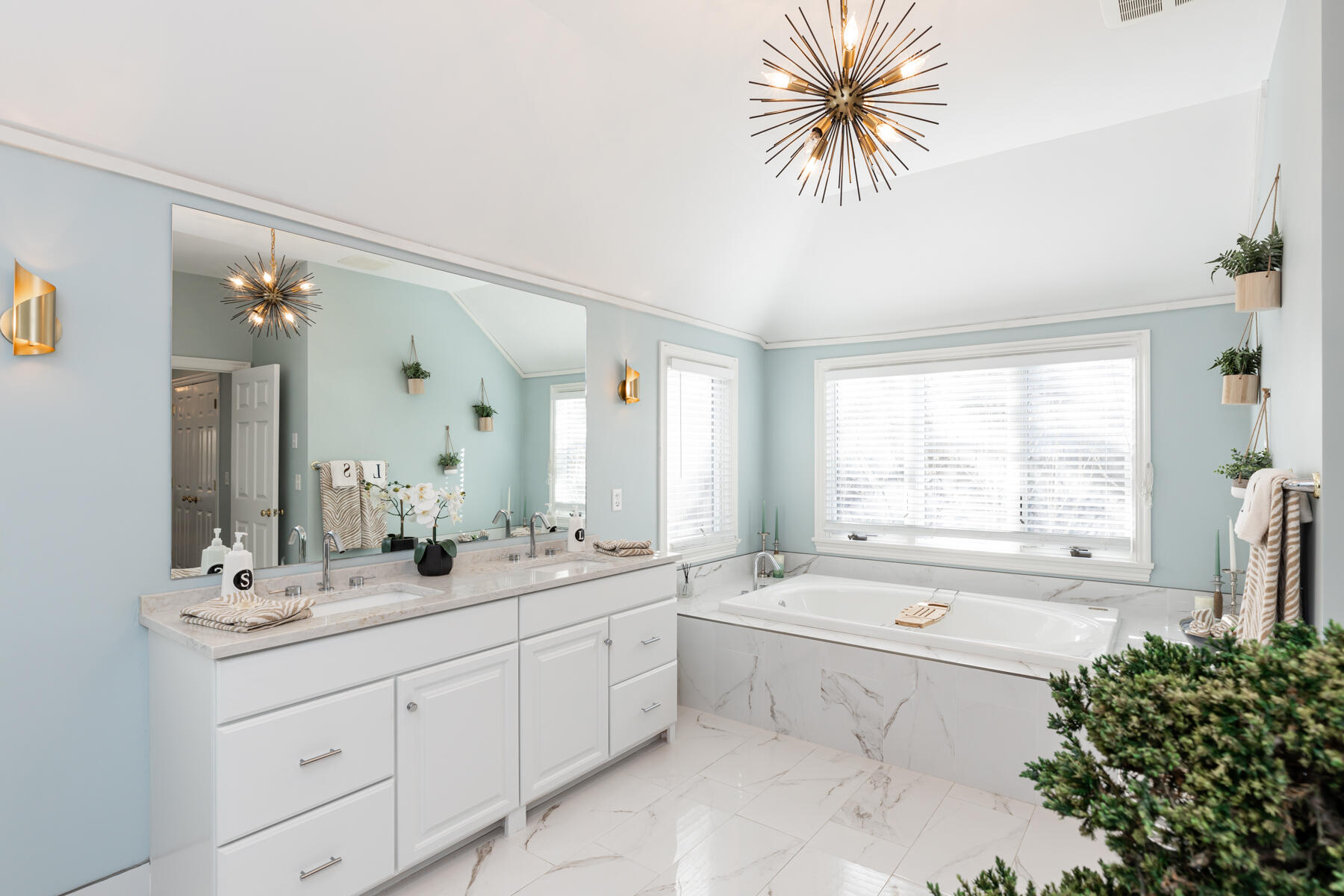 135 Paddock Circle Mashpee, MA 02649 - Photo 33 of 60 a bathroom with a tub sink and mirror