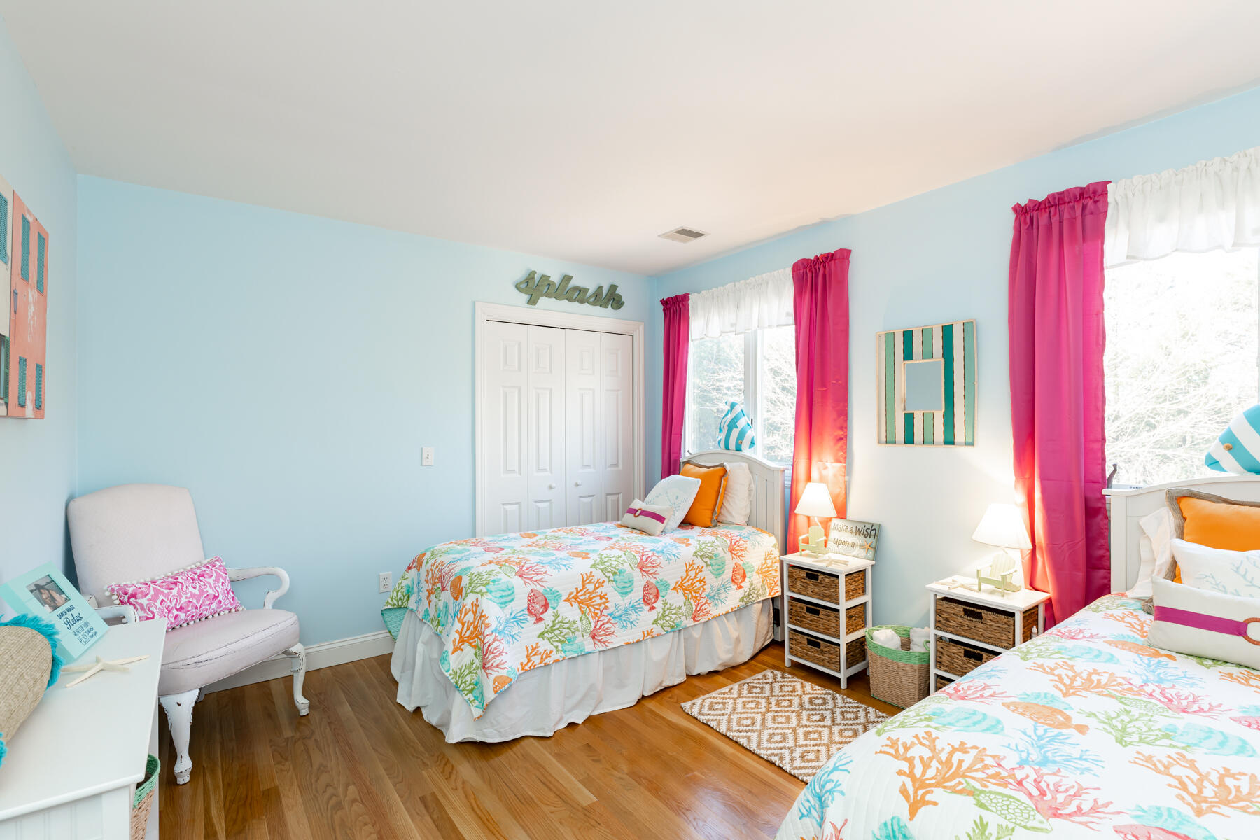 135 Paddock Circle Mashpee, MA 02649 - Photo 38 of 60 a bedroom with a bed and wooden floor