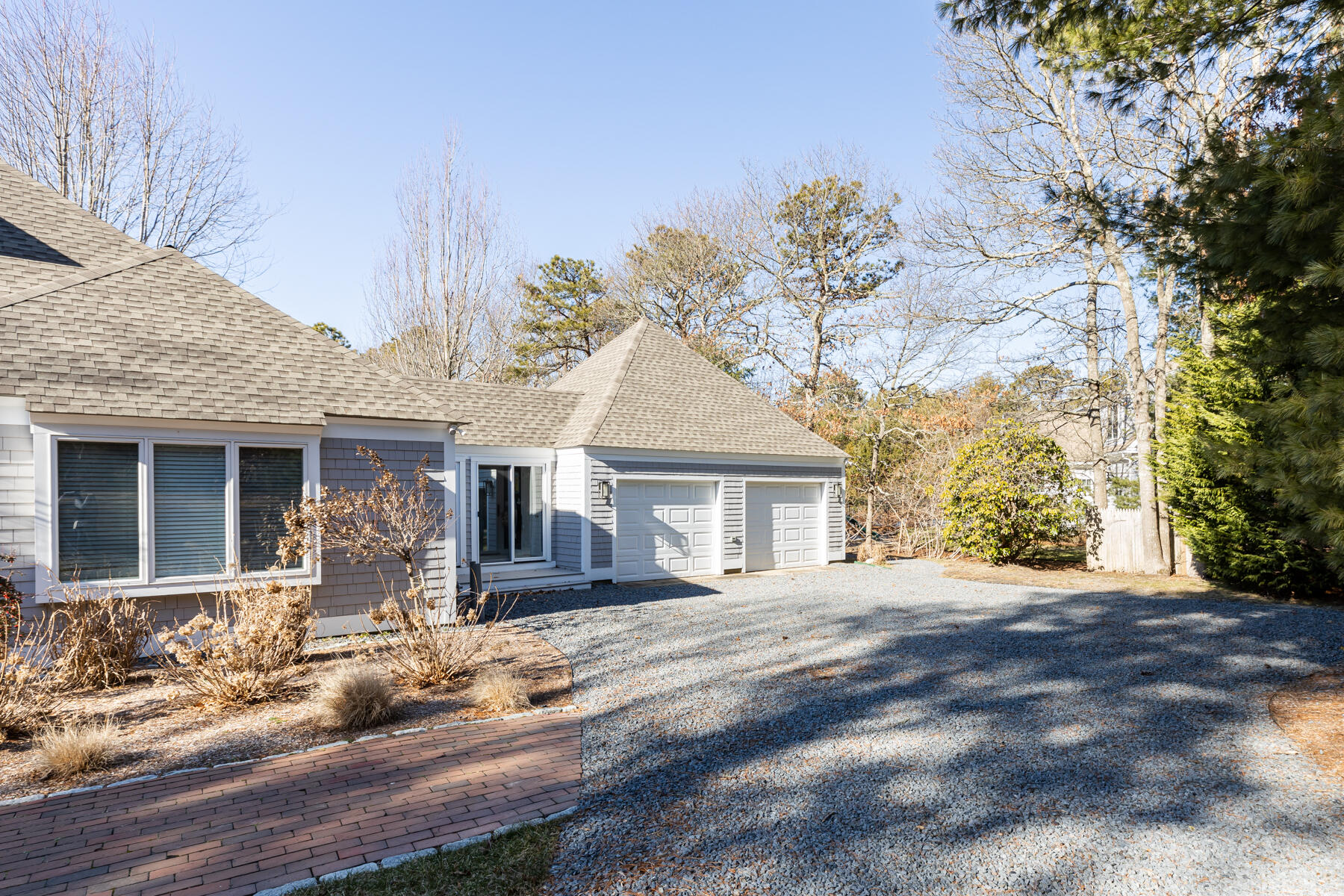 135 Paddock Circle Mashpee, MA 02649 - Photo 4 of 60 front view of a house with a outdoor space