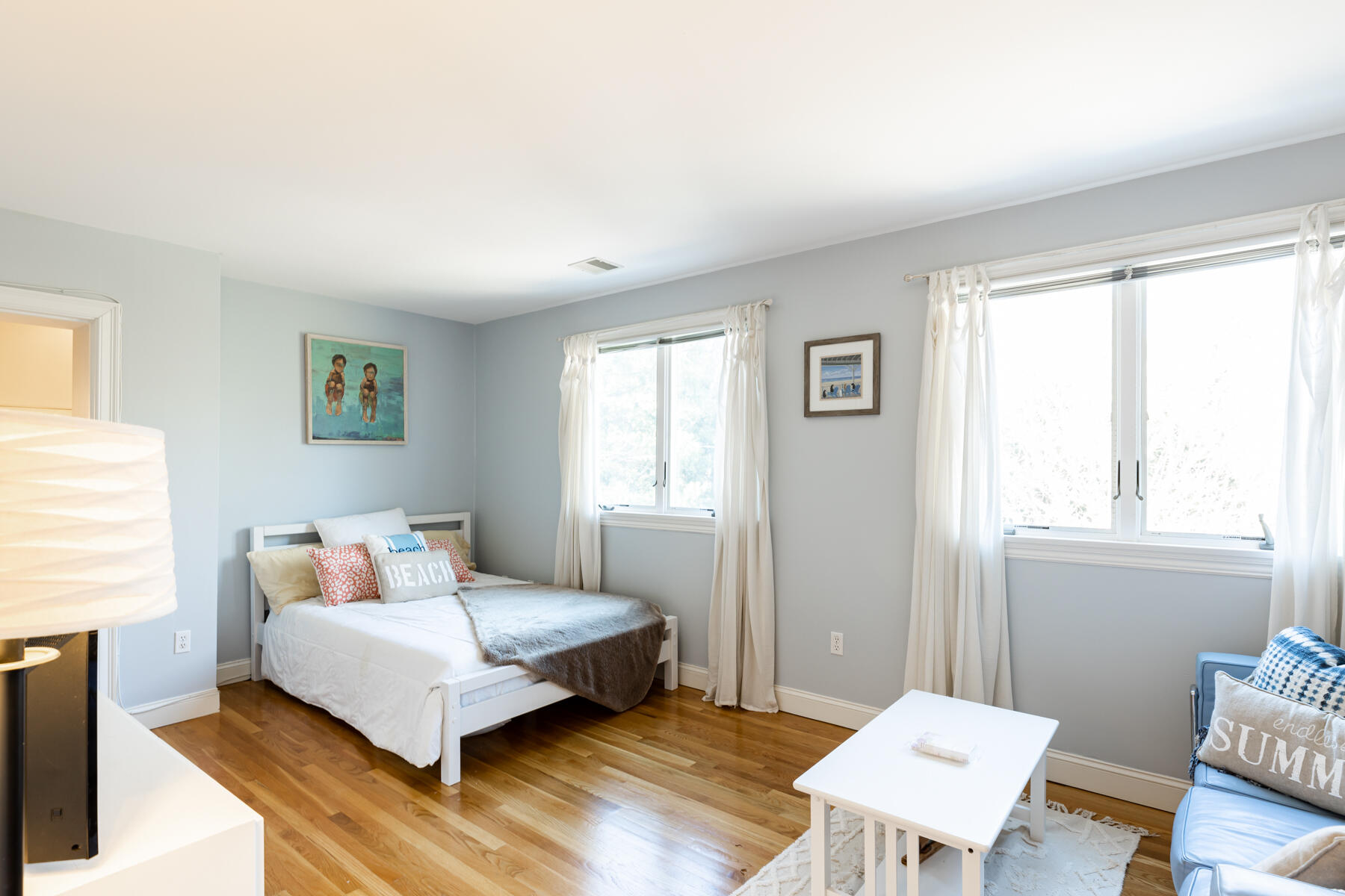 135 Paddock Circle Mashpee, MA 02649 - Photo 41 of 60 a bedroom with a bed and wooden floor