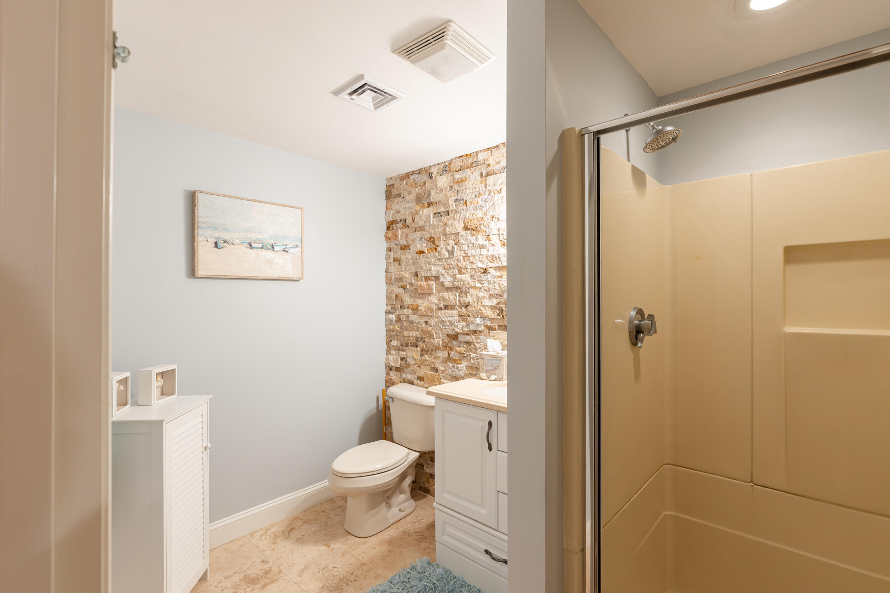 135 Paddock Circle Mashpee, MA 02649 - Photo 50 of 60 a bathroom with a toilet and a shower