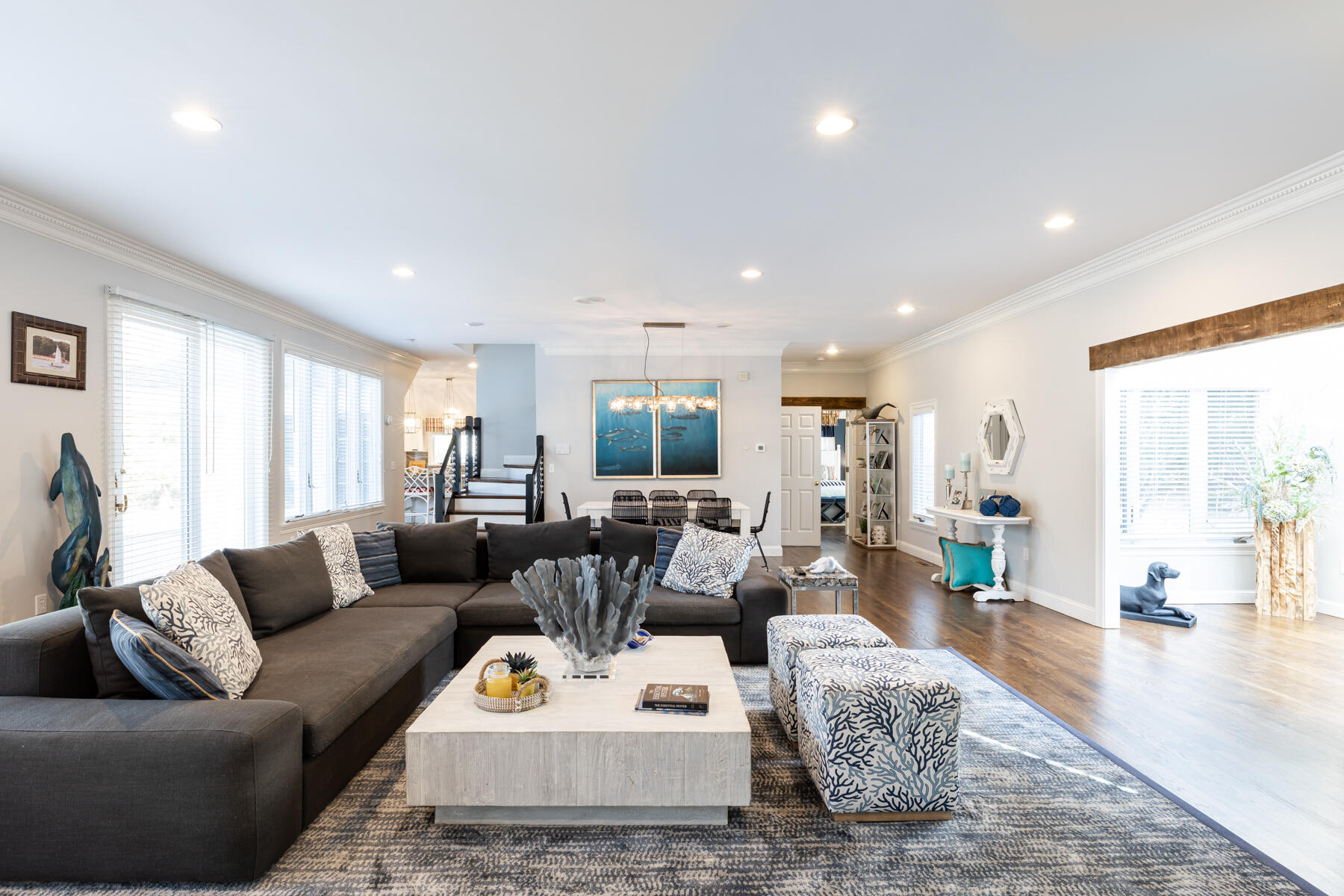 135 Paddock Circle Mashpee, MA 02649 - Photo 10 of 60 a living room with furniture kitchen view and a large window
