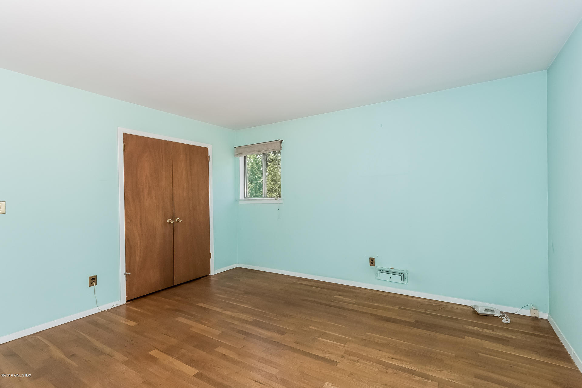 15 Amherst Road Riverside, CT 06878 - Photo 12 of 27 a view of a room with wooden floor and window