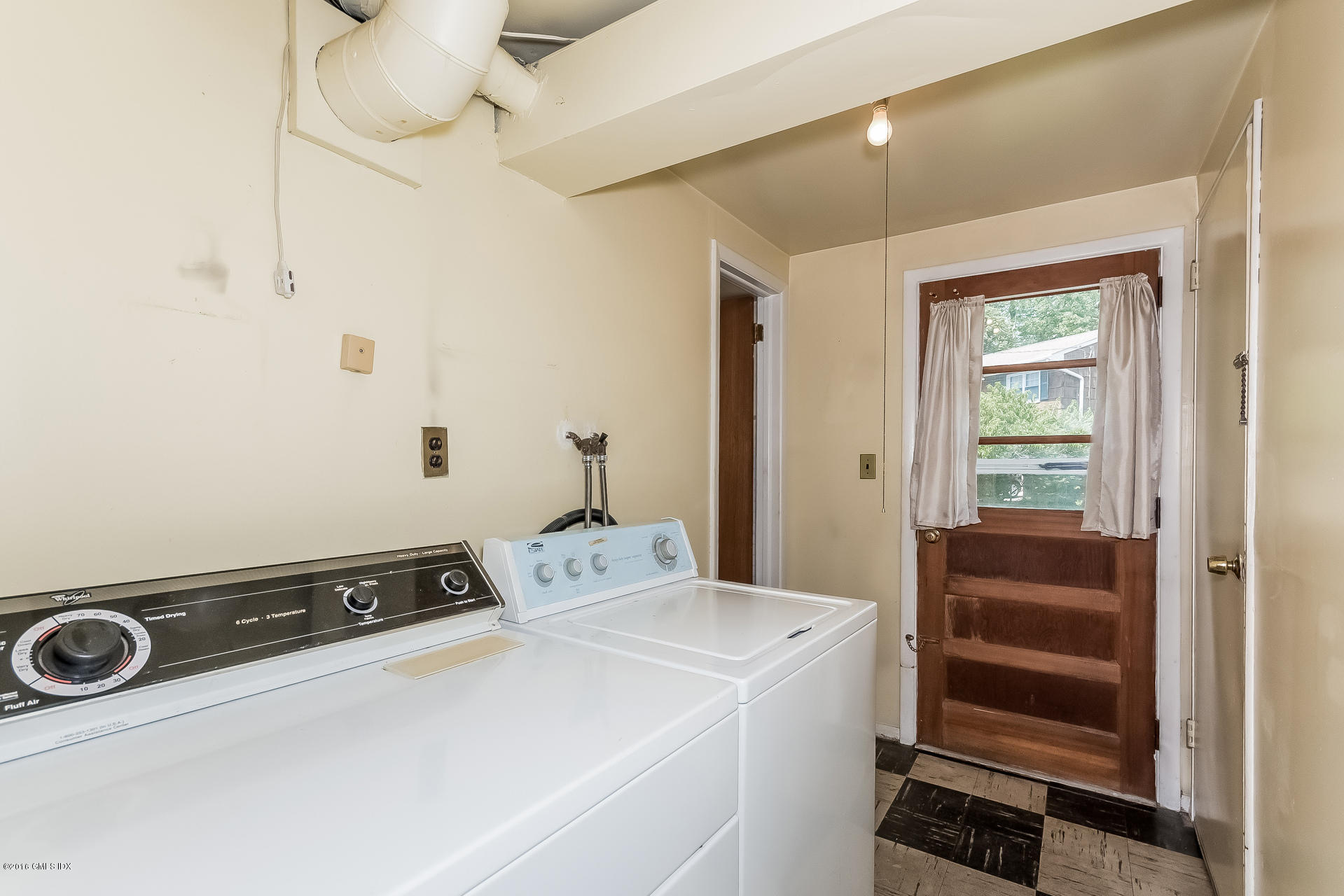15 Amherst Road Riverside, CT 06878 - Photo 20 of 27 a utility room with dryer and washer