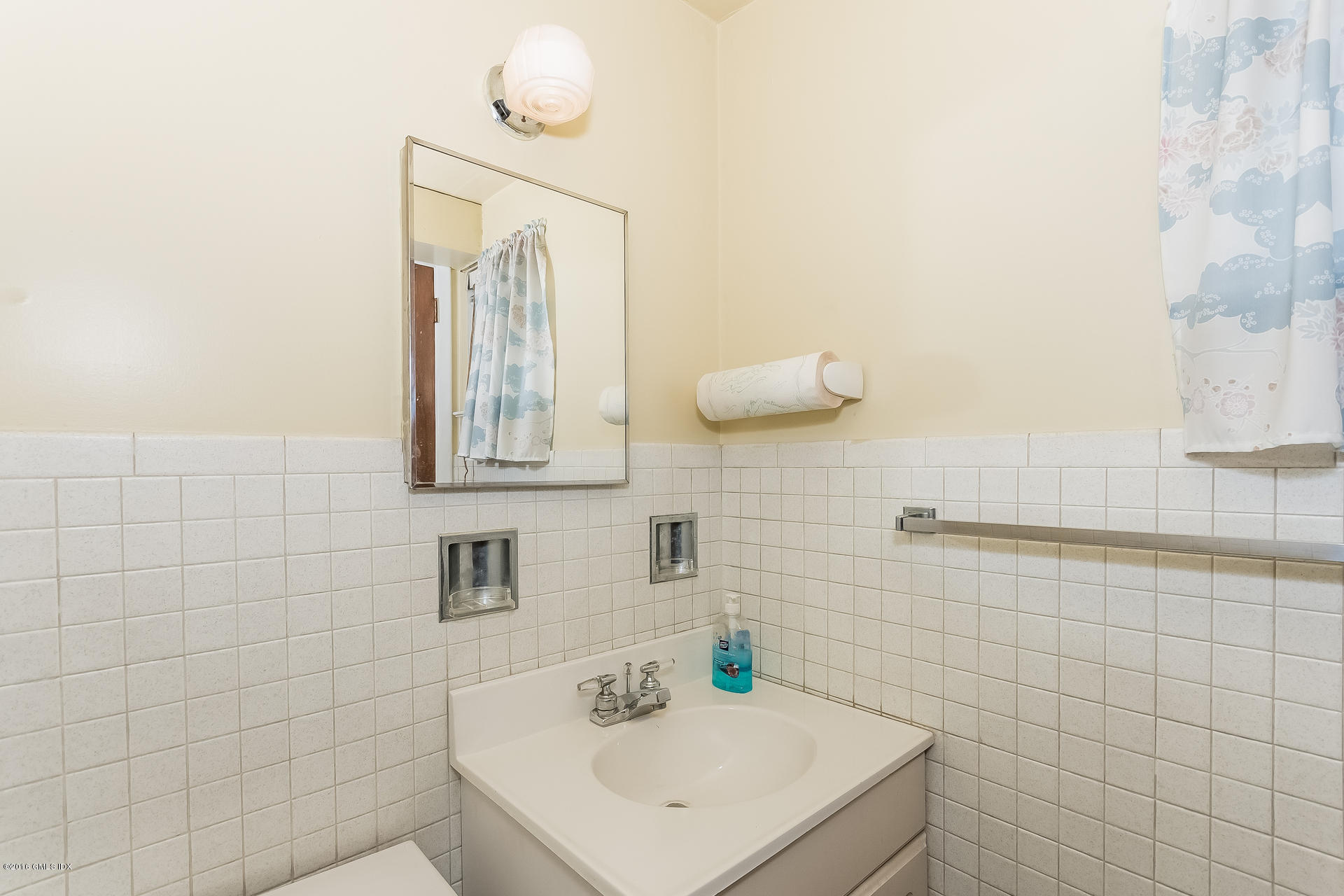 15 Amherst Road Riverside, CT 06878 - Photo 21 of 27 a bathroom with a sink vanity and mirror