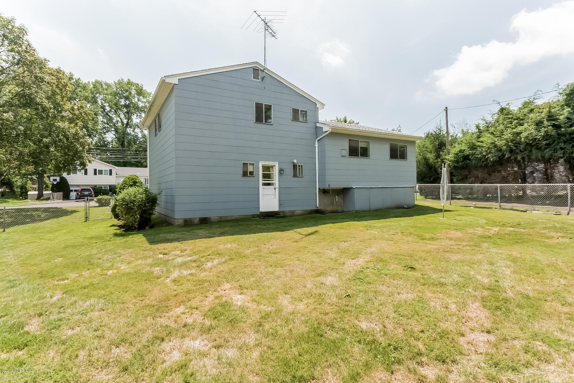 15 Amherst Road Riverside, CT 06878 - Photo 23 of 27 a house view with a outdoor space